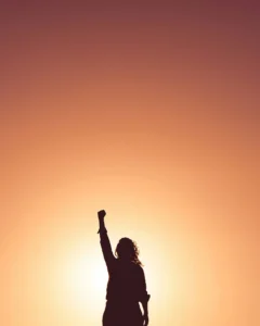 women raising fist