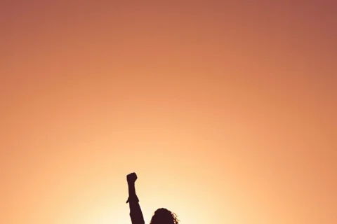 women raising fist